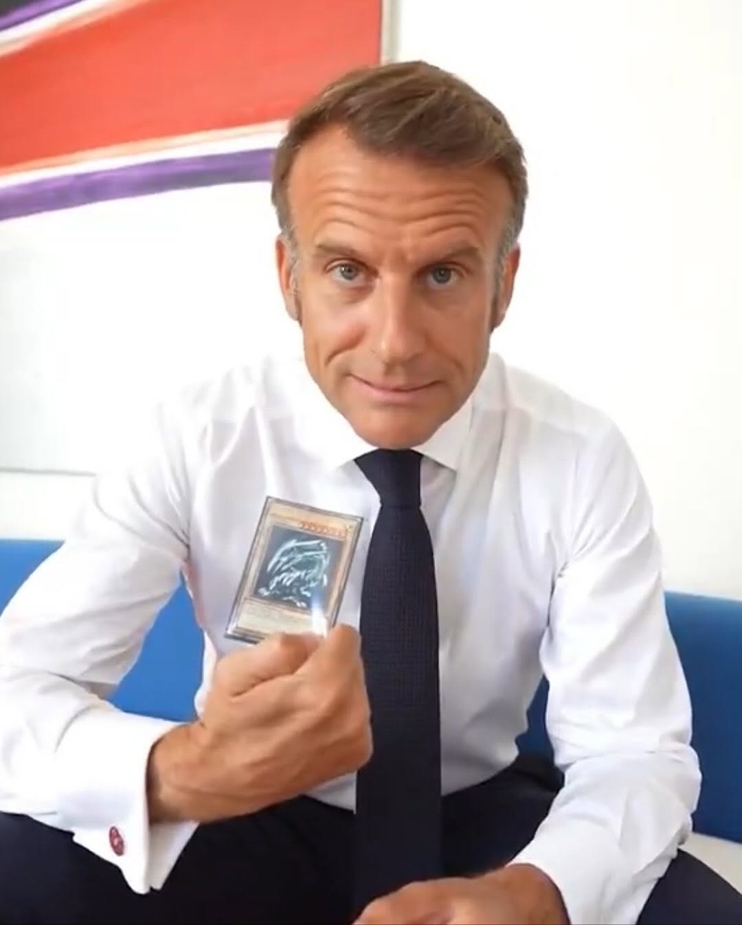 French President Emmanuel Macron Goes Viral Holding a Blue-Eyes White Dragon